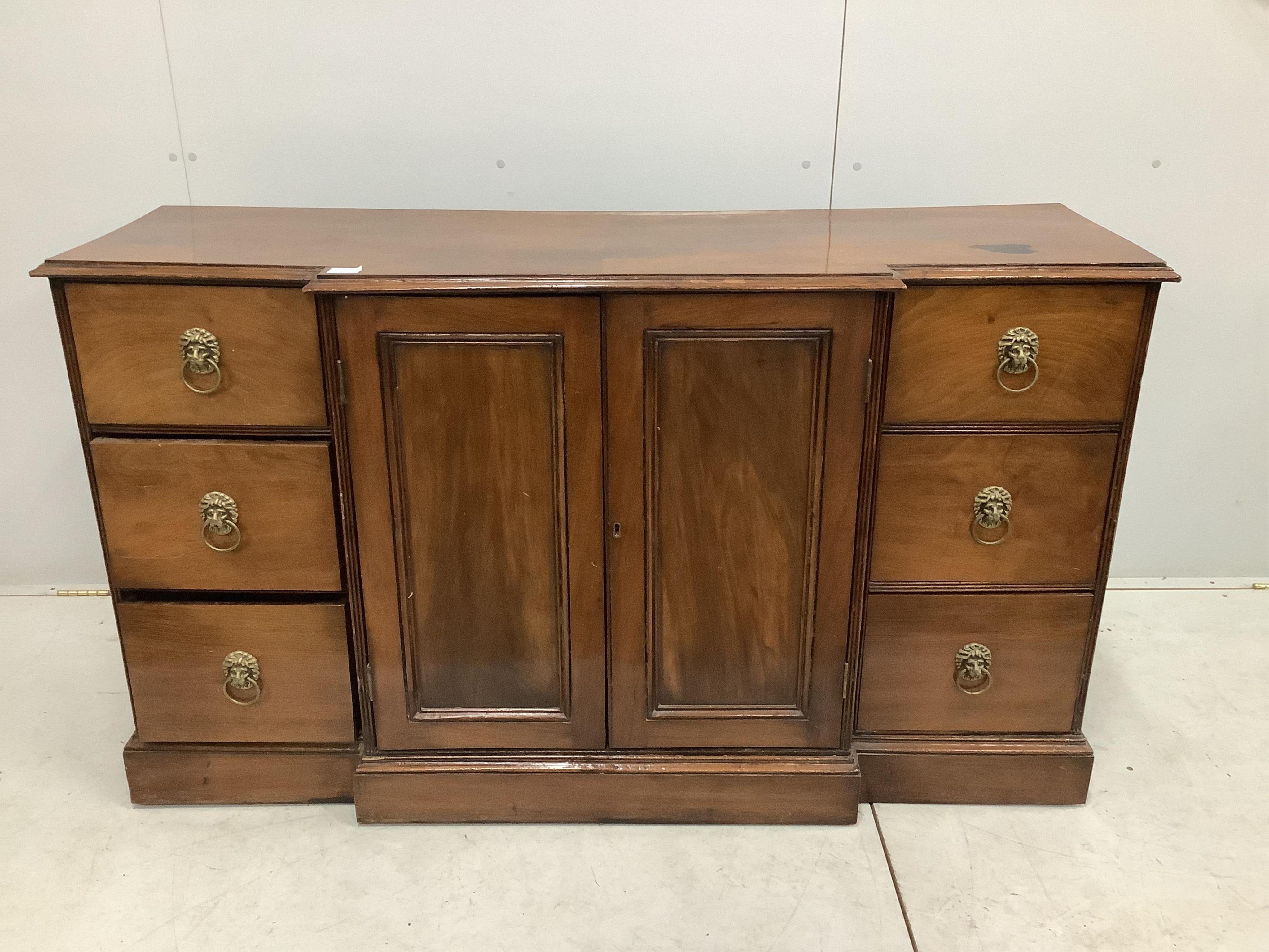 A George IV style mahogany breakfront dwarf cabinet, width 152cm, depth 49cm, height 87cm. Condition - fair, top has a large dark blemish